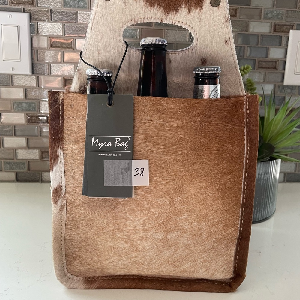 Beer caddy tote. Holds six. Cowhide